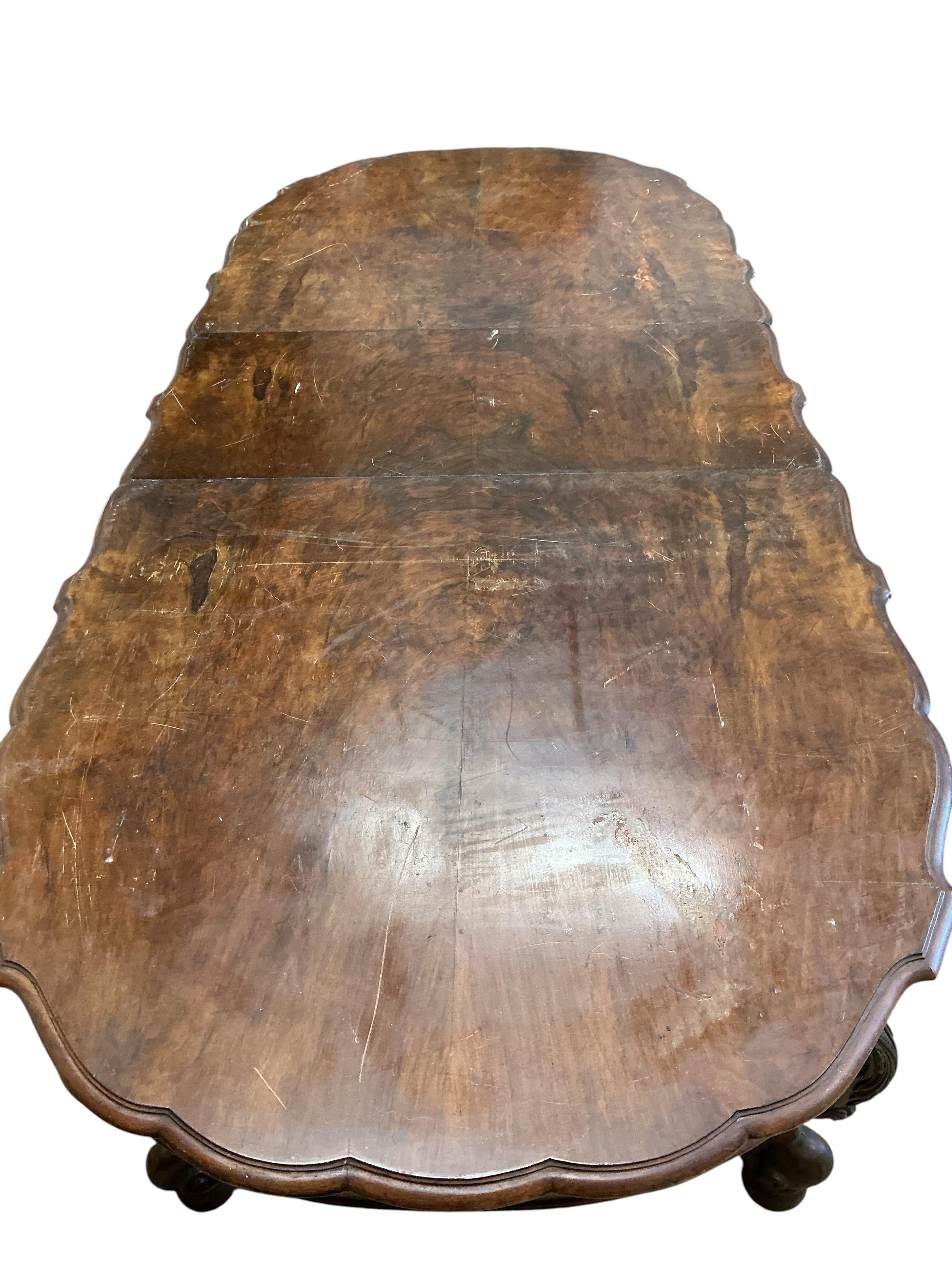 A late 19th century Continental walnut extending dining table, 264cm extended, one spare leaf, depth 114cm, height 73cm